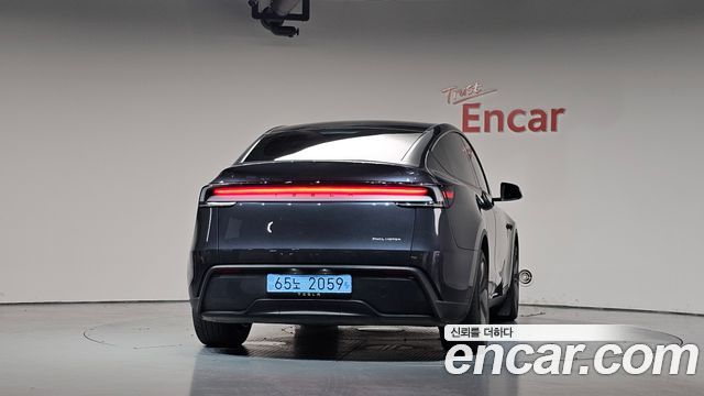 Tesla Model Y Long Range AWD — пробег 26 853 км — фото 4 из 5