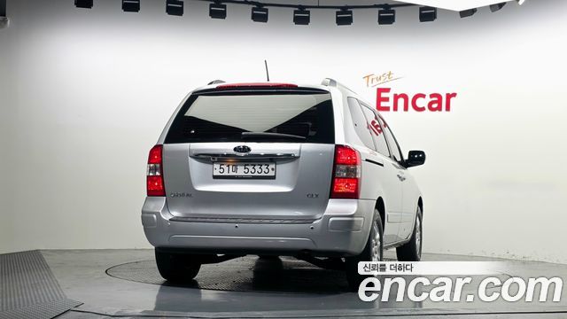 Kia Carnival New Carnival GLX Standard — пробег 106 373 км — фото 4 из 5