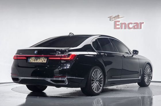 BMW 7-Series 730d xDrive Design Pure Excellence — пробег 145 477 км — фото 2 из 5