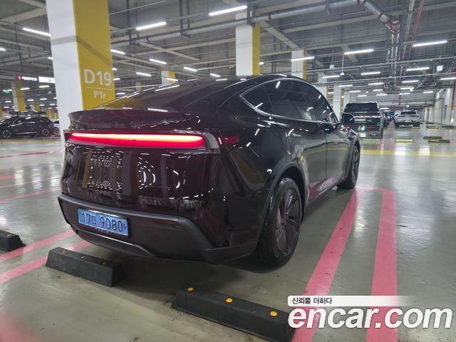 Tesla Model Y Premium Long Range AWD — пробег 1 500 км — фото 4 из 5