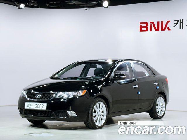 Kia Porte 1.6 CVVT Premium Si Black — пробег 146 301 км — фото 1 из 5
