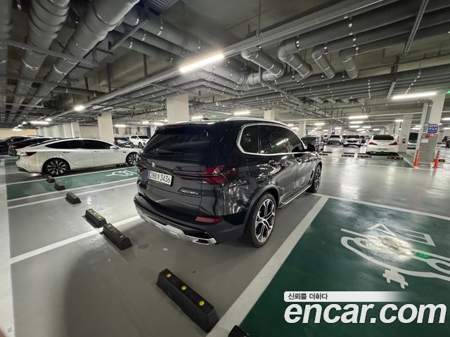 BMW X5 xDrive 50e xLine — пробег 32 210 км — фото 3 из 5