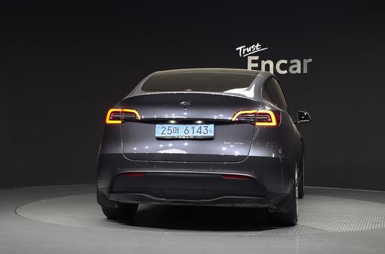 Tesla Model Y Long Range AWD — пробег 100 787 км — фото 4 из 5