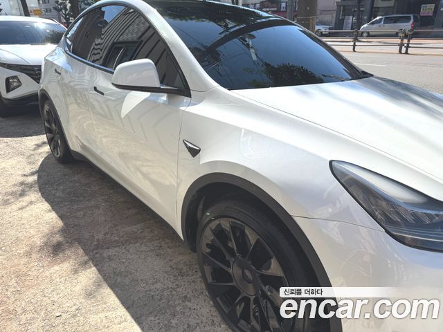 Tesla Model Y Standard Range RWD — пробег 103 200 км — фото 1 из 5
