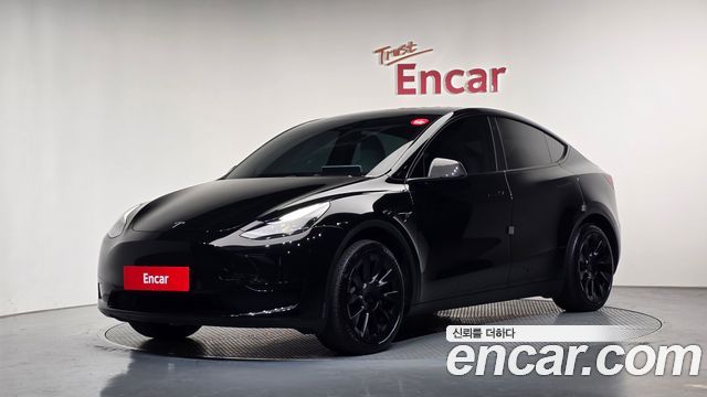 Tesla Model Y RWD — пробег 65 819 км — фото 1 из 5