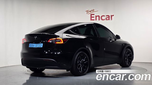 Tesla Model Y RWD — пробег 65 819 км — фото 2 из 5