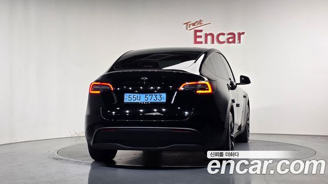 Tesla Model Y RWD — пробег 65 819 км — фото 4 из 5