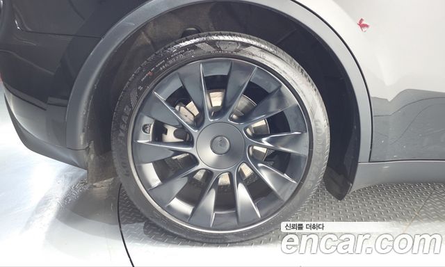 Tesla Model Y RWD — пробег 65 819 км — фото 5 из 5