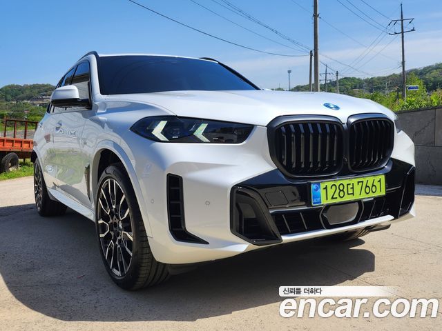BMW X5 xDrive 50e M Sport — пробег 1 008 км — фото 1 из 5
