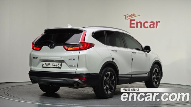 Honda CR-V 1.5 Touring 4WD — пробег 145 008 км — фото 2 из 5
