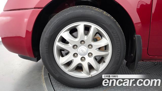 Kia Carnival Grand Carnival GLX Premium — пробег 159 116 км — фото 5 из 5