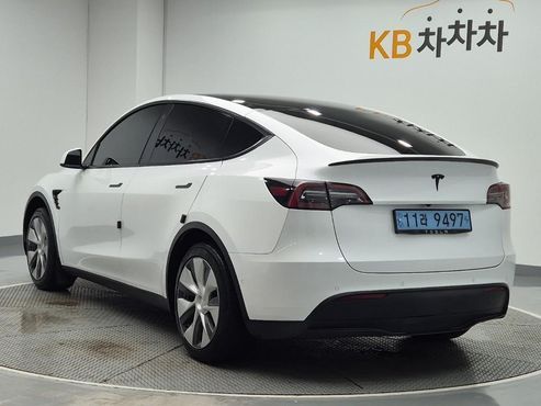 Tesla Model Y Standard Range RWD — пробег 79 497 км — фото 2 из 5