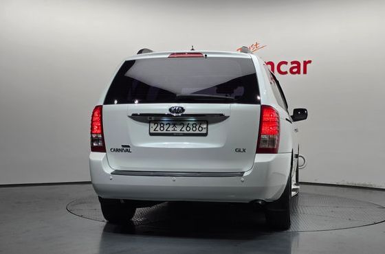Kia Carnival Grand Carnival GLX Premium — пробег 140 529 км — фото 4 из 5