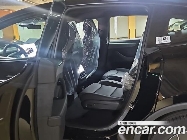 Tesla Model Y L Long Range AWD — пробег 1 км — фото 4 из 5