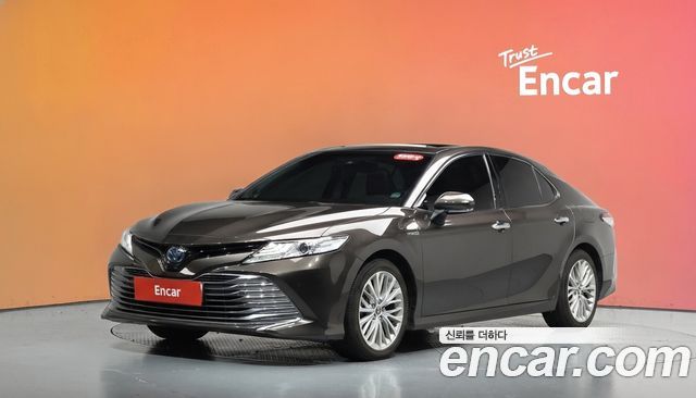Toyota Camry 2.5 XLE Hybrid — пробег 132 999 км — фото 1 из 5