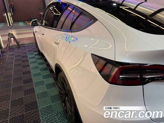 Tesla Model Y RWD — пробег 125 629 км — фото 5 из 5