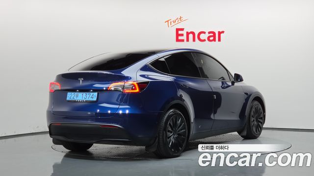 Tesla Model Y Standard Range RWD — пробег 83 582 км — фото 2 из 5