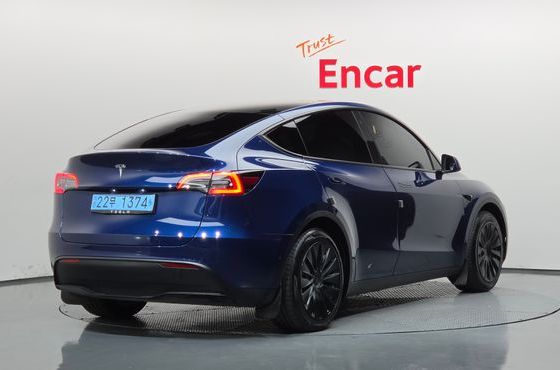 Tesla Model Y Standard Range RWD — пробег 83 582 км — фото 2 из 5