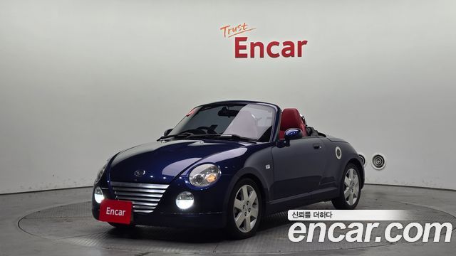 Daihatsu Copen 0.6 — пробег 150 728 км — фото 1 из 5