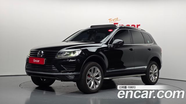 Volkswagen Touareg V6 3.0 TDI Bluemotion Premium 7P5 — пробег 244 082 км — фото 1 из 5