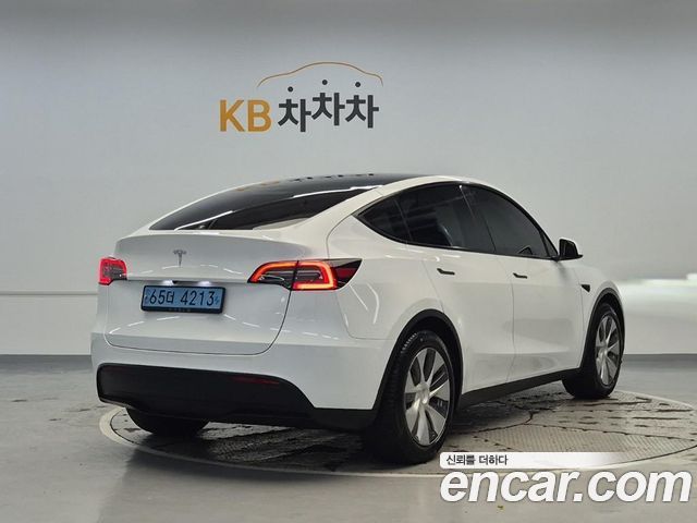 Tesla Model Y RWD — пробег 83 317 км — фото 3 из 5