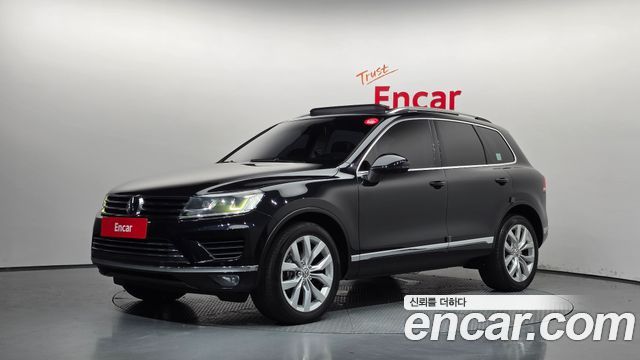 Volkswagen Touareg V6 3.0 TDI Bluemotion Premium 7P5 — пробег 218 056 км — фото 1 из 5