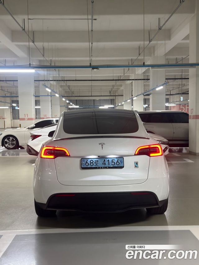 Tesla Model Y RWD — пробег 59 927 км — фото 4 из 5