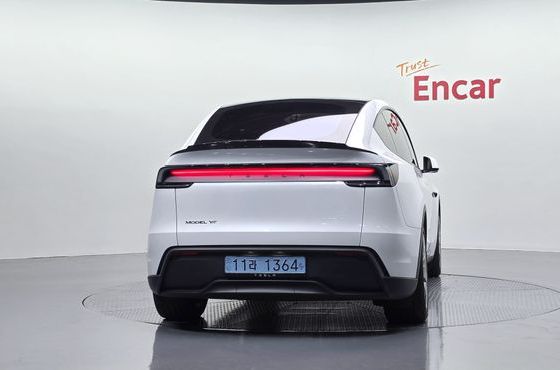 Tesla Model Y L Long Range AWD — пробег 4 998 км — фото 4 из 5