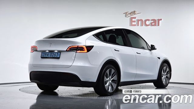 Tesla Model Y RWD — пробег 49 311 км — фото 2 из 5