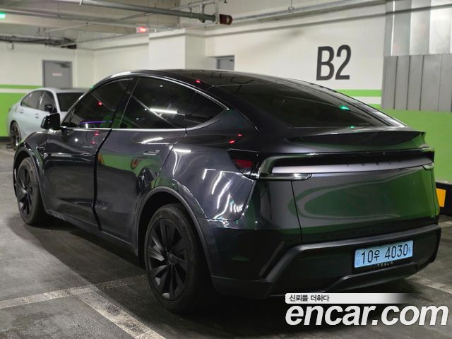 Tesla Model Y RWD — пробег 27 300 км — фото 5 из 5