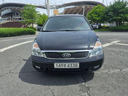 Kia Carnival Grand Carnival GLX Premium — пробег 145 000 км — фото 1 из 5