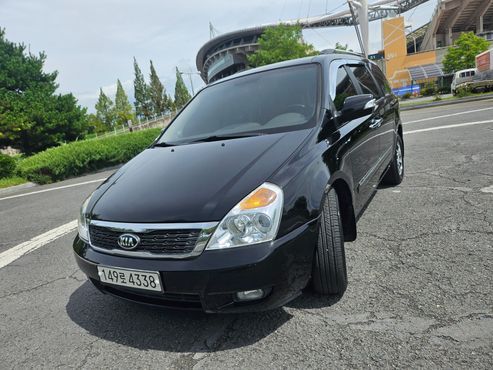 Kia Carnival Grand Carnival GLX Premium — пробег 145 000 км — фото 4 из 5