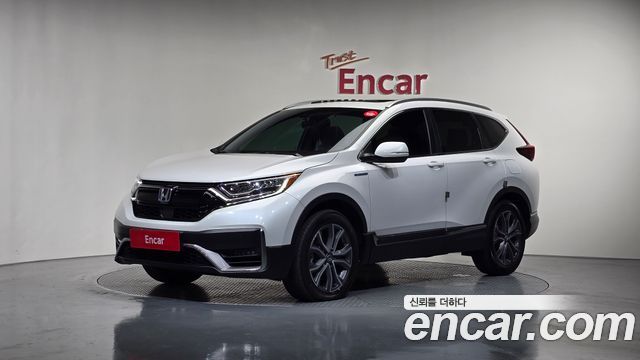 Honda CR-V 2.0 Hybrid Touring 4WD — пробег 77 334 км — фото 1 из 5