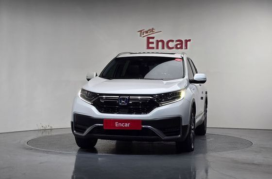 Honda CR-V 2.0 Hybrid Touring 4WD — пробег 77 334 км — фото 3 из 5