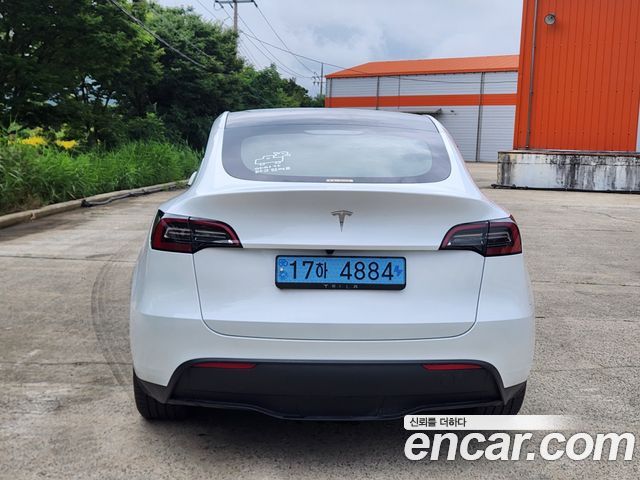 Tesla Model Y RWD — пробег 25 000 км — фото 4 из 5