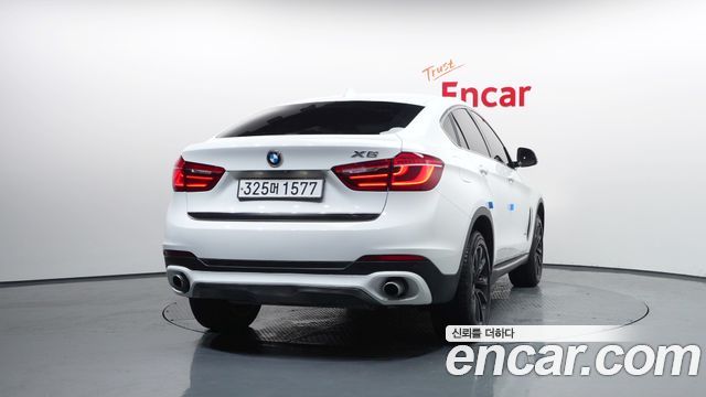 BMW X6 xDrive 35i — пробег 130 323 км — фото 4 из 5