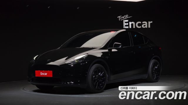 Tesla Model Y RWD — пробег 56 610 км — фото 1 из 5