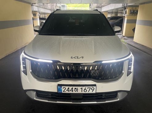 Kia Carnival HEV 9 seater Prestige — пробег 1 800 км — фото 1 из 5