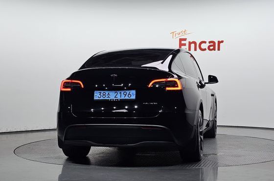 Tesla Model Y Long Range AWD — пробег 57 887 км — фото 4 из 5