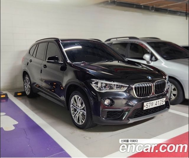 BMW X1 xDrive 18d Joy — пробег 64 877 км — фото 2 из 5